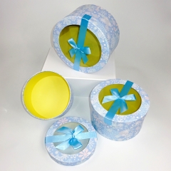 Romantisches blaues rundes Papierkasten-Set mit Bogen und Deckel