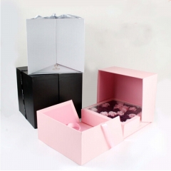 Kreative Design-Blumen-Papiergeschenkbox mit Band